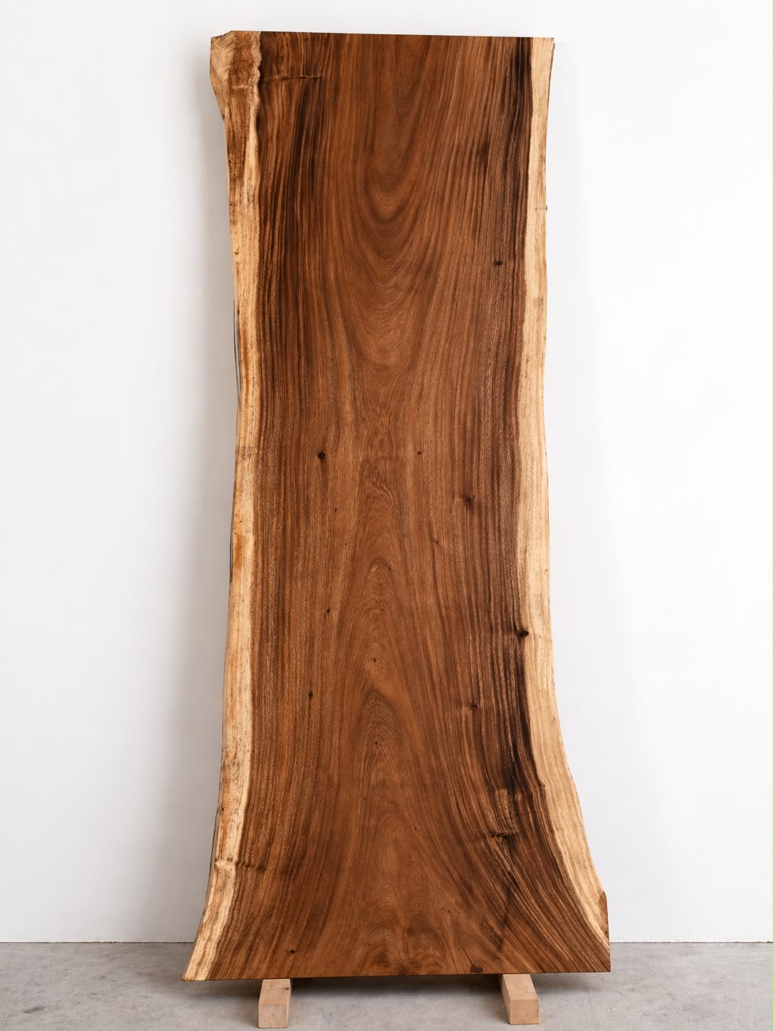 Saman live-edge dining table slab photographed in Ecuador — Platinum Luxury Teak