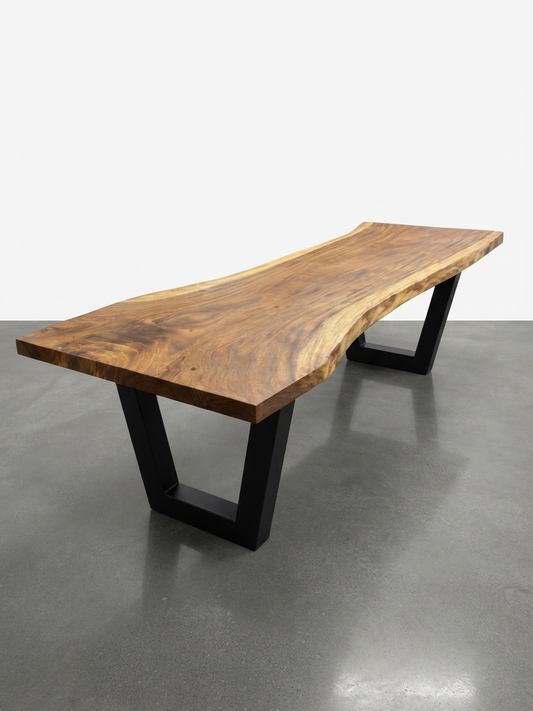 Slab No. 02: 10 ft single-slab Saman (monkeypod) live-edge boardroom table on a black steel base, on a white background. This photo identifies the listing; warehouse photographs of the slab follow.