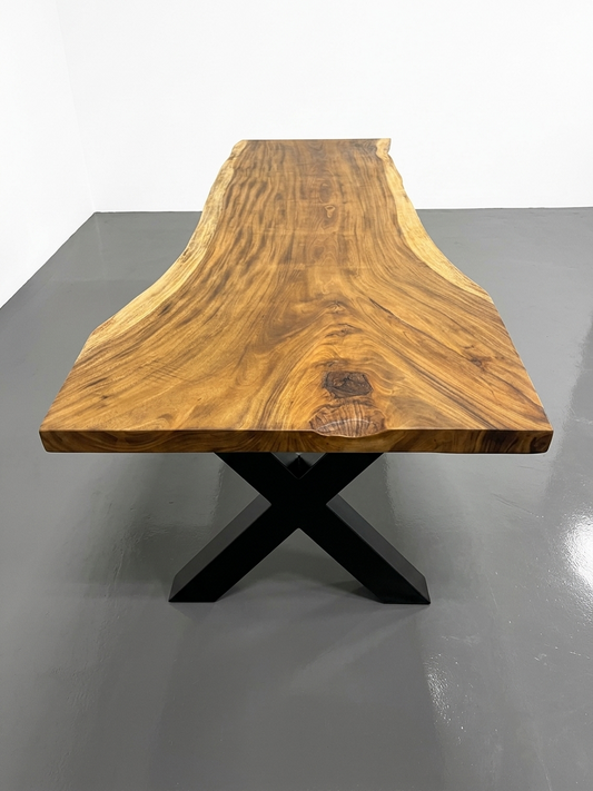 Slab No. 01: 10 ft single-slab Saman (monkeypod) live-edge conference table on a black steel base, on a white background. This photo identifies the listing; warehouse photographs of the slab follow.