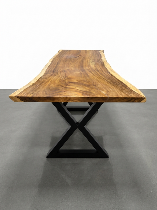 Slab No. 13: 9 ft single-slab Saman (monkeypod) live-edge conference table on a black steel base, on a white background. This photo identifies the listing; warehouse photographs of the slab follow.