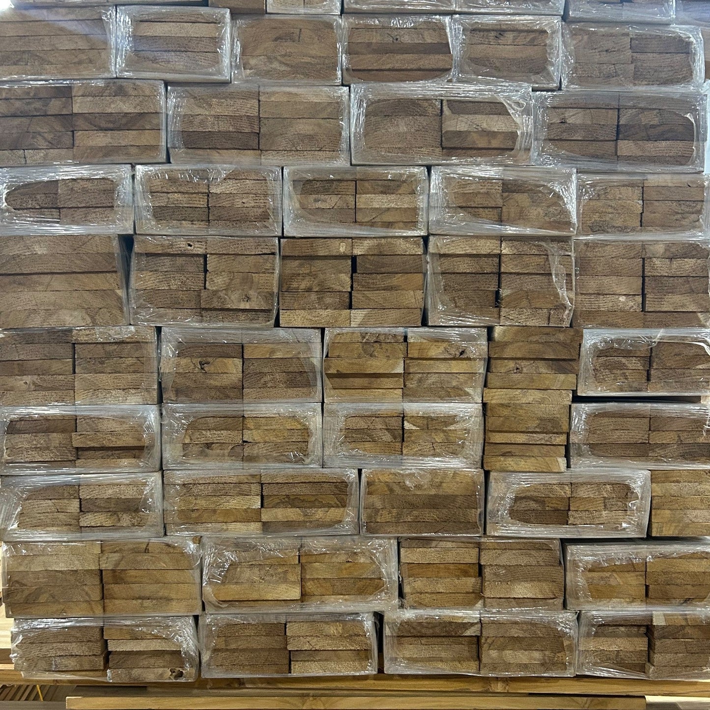 Ecuadorian plantation teak narrow stock bundled and wrapped for face-frame and edge-banding work — Platinum Luxury Teak, Lincolnwood Illinois