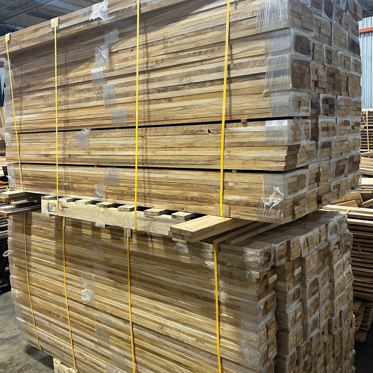 Ecuadorian plantation teak, 7–8 ft long premium stock, banded and palletized at the Lincolnwood Illinois warehouse — Platinum Luxury Teak