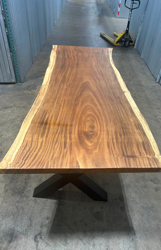 Single-slab Saman monkeypod live-edge table, 9 ft, on a black steel base — Platinum Luxury Teak, Chicago