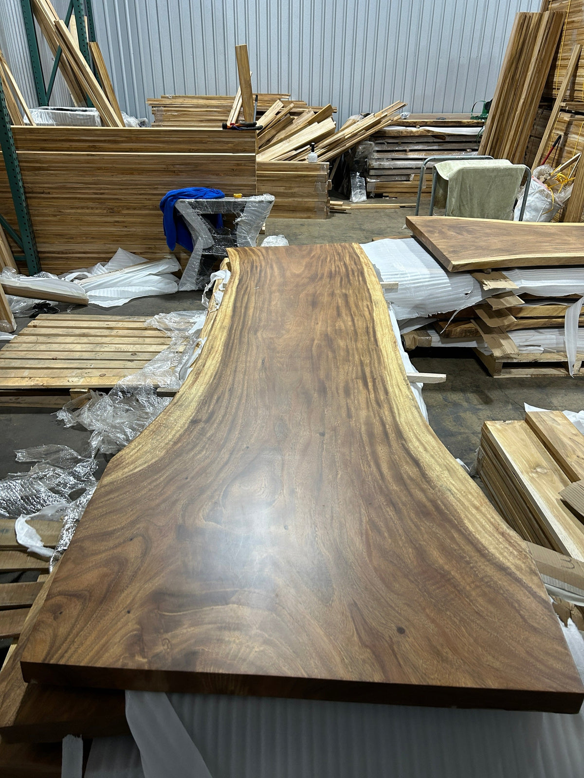 Slab No. 02, first face - the actual 10 ft single-slab Saman monkeypod top, matte lacquer finish, photographed in our Lincolnwood IL warehouse
