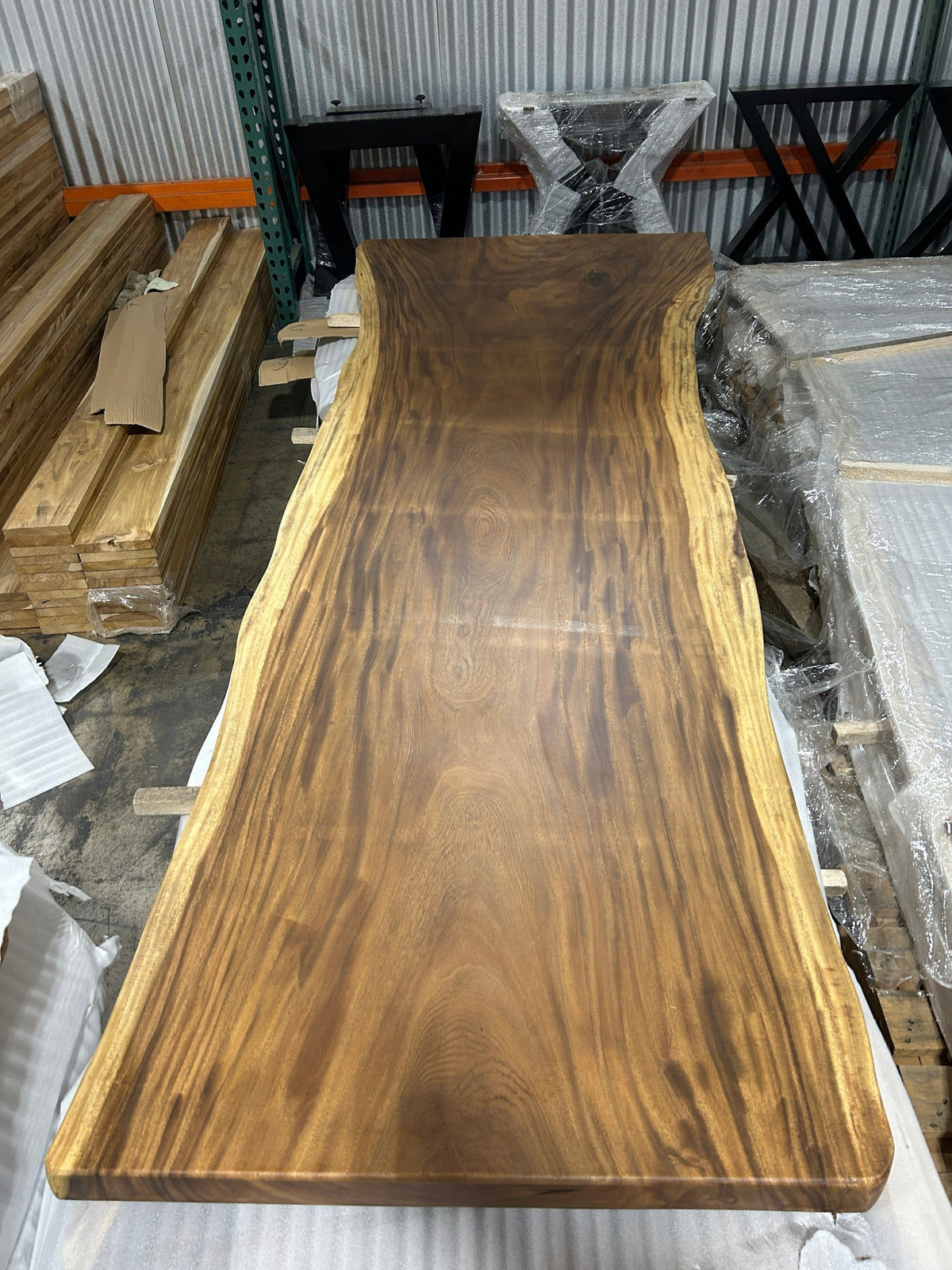 Slab No. 04, first face - the actual 10 ft single-slab Saman monkeypod top, matte lacquer finish, photographed in our Lincolnwood IL warehouse