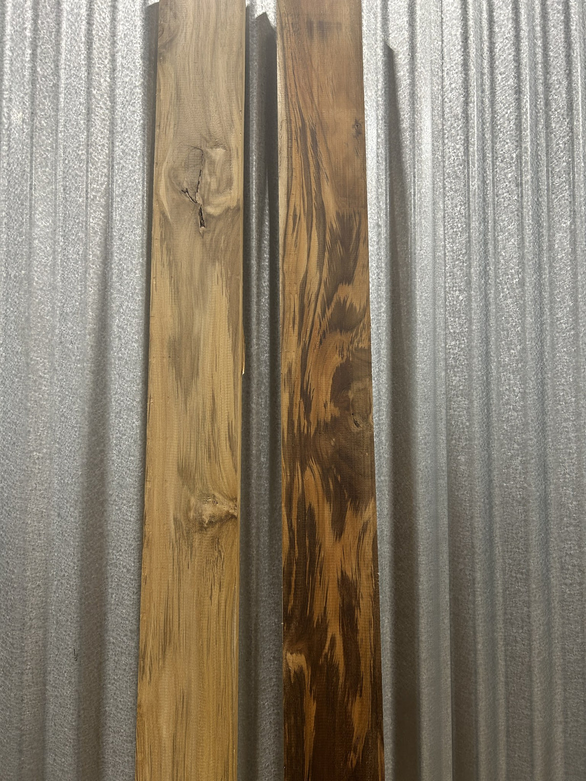 Two long Ecuadorian teak boards standing side by side: left as it ships, right with one wipe of oil — Platinum Luxury Teak, Lincolnwood IL