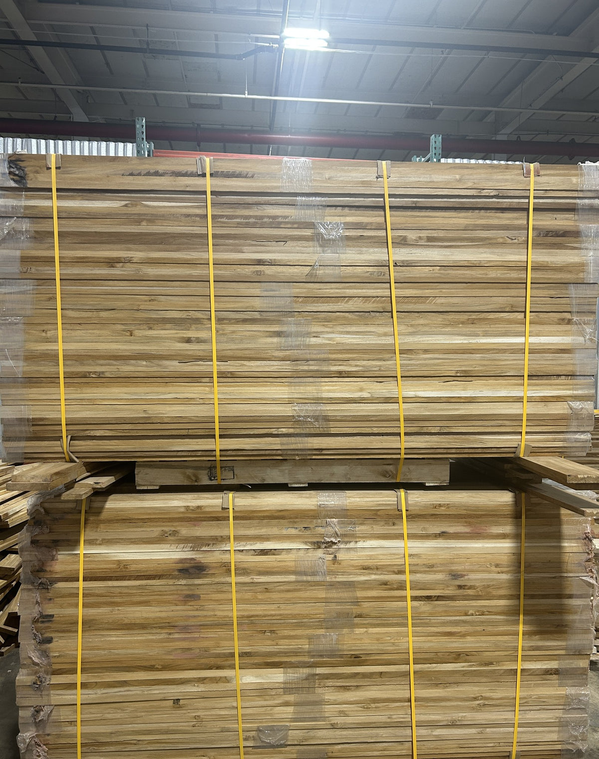 Two banded pallets of Ecuadorian teak lumber in the Lincolnwood IL warehouse — Platinum Luxury Teak